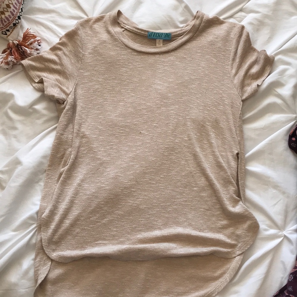 Light brown shirt.